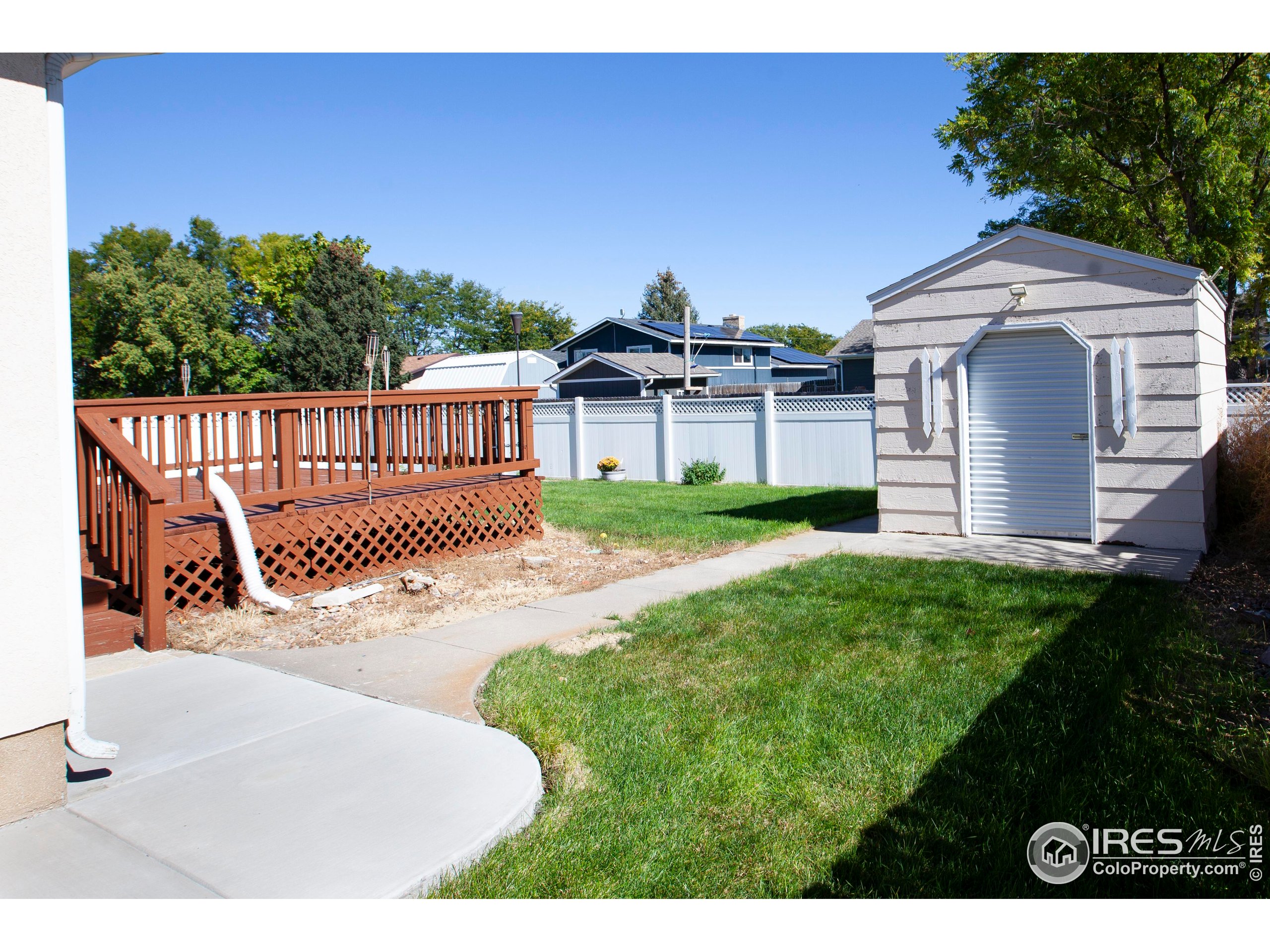 1815 Robin Road Sterling, CO 80751 - Photo 45 of 45 a view of a backyard with a garden