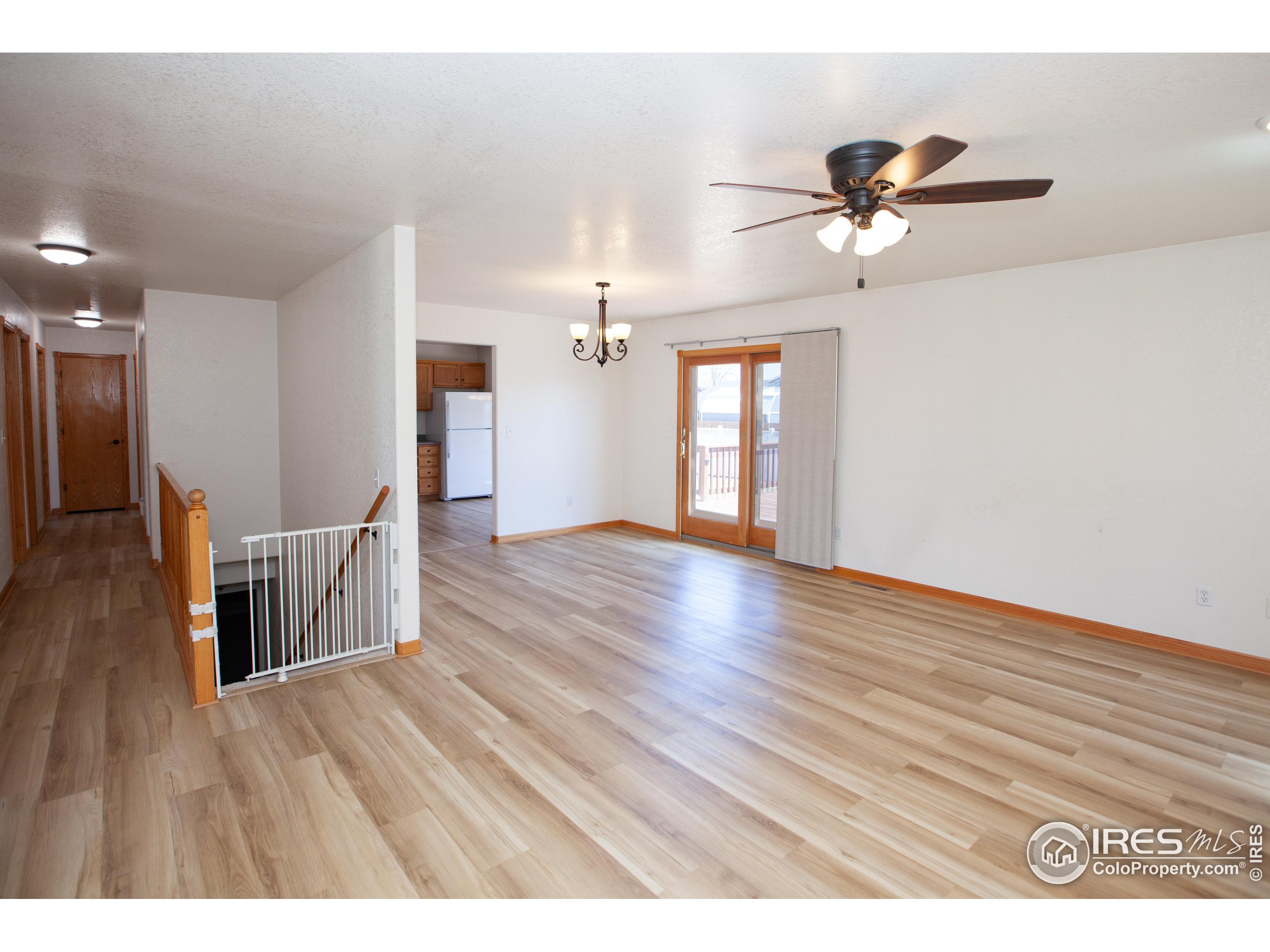 1815 Robin Road Sterling, CO 80751 - Photo 5 of 45 a view interior of a house wooden floor and windows