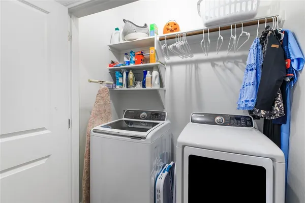 a utility room with dryer and washer