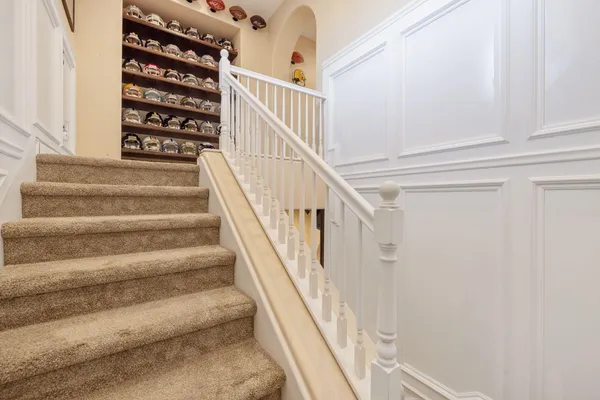 a bath room with a toilet and a bath tub