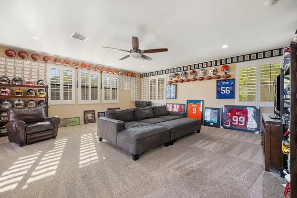 a view of a water fountain in the backyard