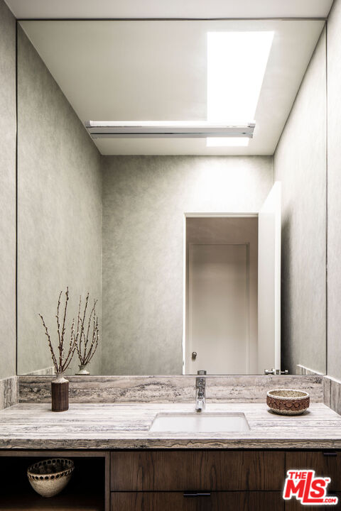 2013 Louella Avenue Venice, CA 90291 - Photo 12 of 26 a bathroom with a sink and a mirror