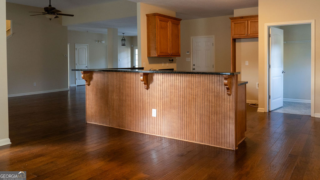 170 Fire Crk Trail Senoia, GA 30276 - Photo 15 of 62 an empty room with wooden floor and a window