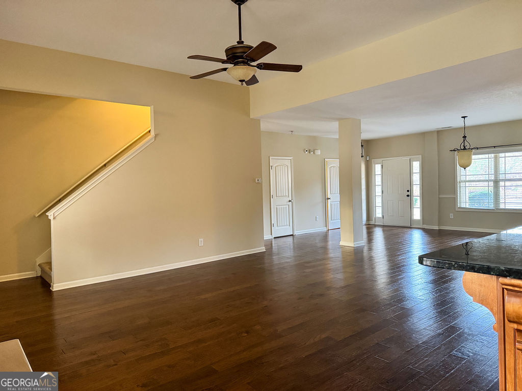 170 Fire Crk Trail Senoia, GA 30276 - Photo 23 of 62 a view of an empty room with wooden floor and a window