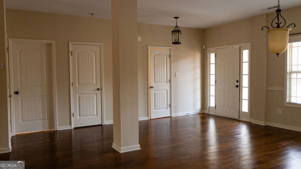 170 Fire Crk Trail Senoia, GA 30276 - Photo 24 of 62 a view of a hallway with wooden floor