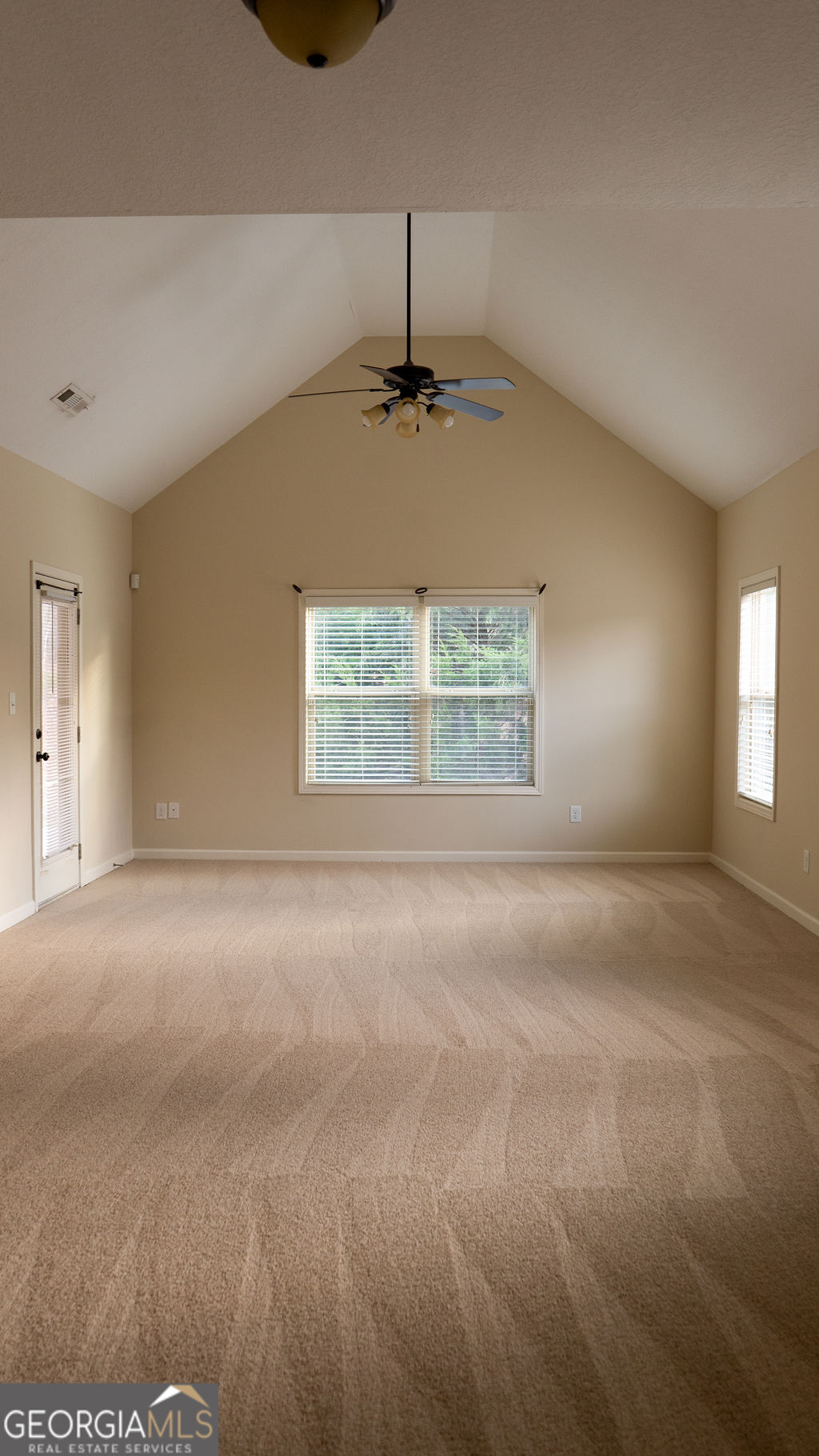 170 Fire Crk Trail Senoia, GA 30276 - Photo 25 of 62 a view of an empty room with a window