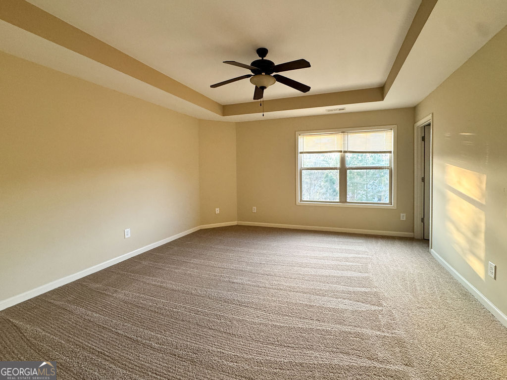 170 Fire Crk Trail Senoia, GA 30276 - Photo 36 of 62 a view of an empty room with a window
