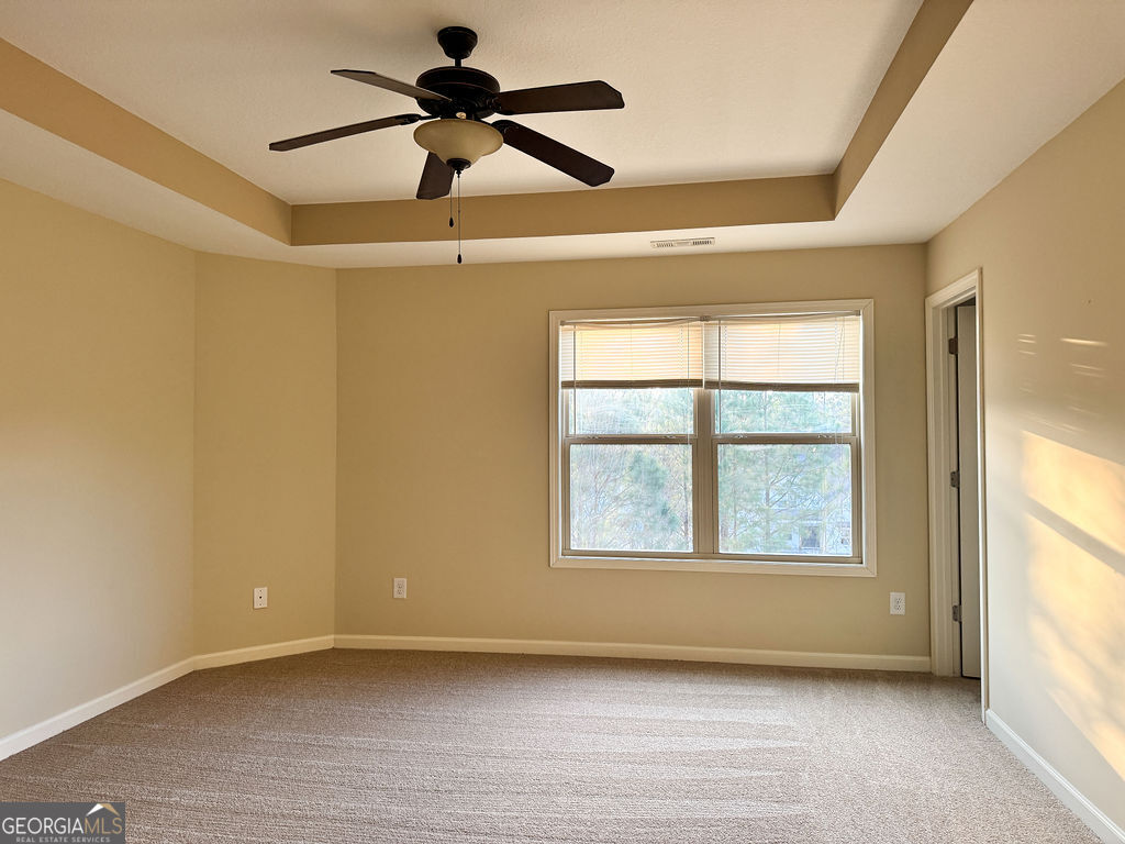 170 Fire Crk Trail Senoia, GA 30276 - Photo 37 of 62 a view of an empty room with a window