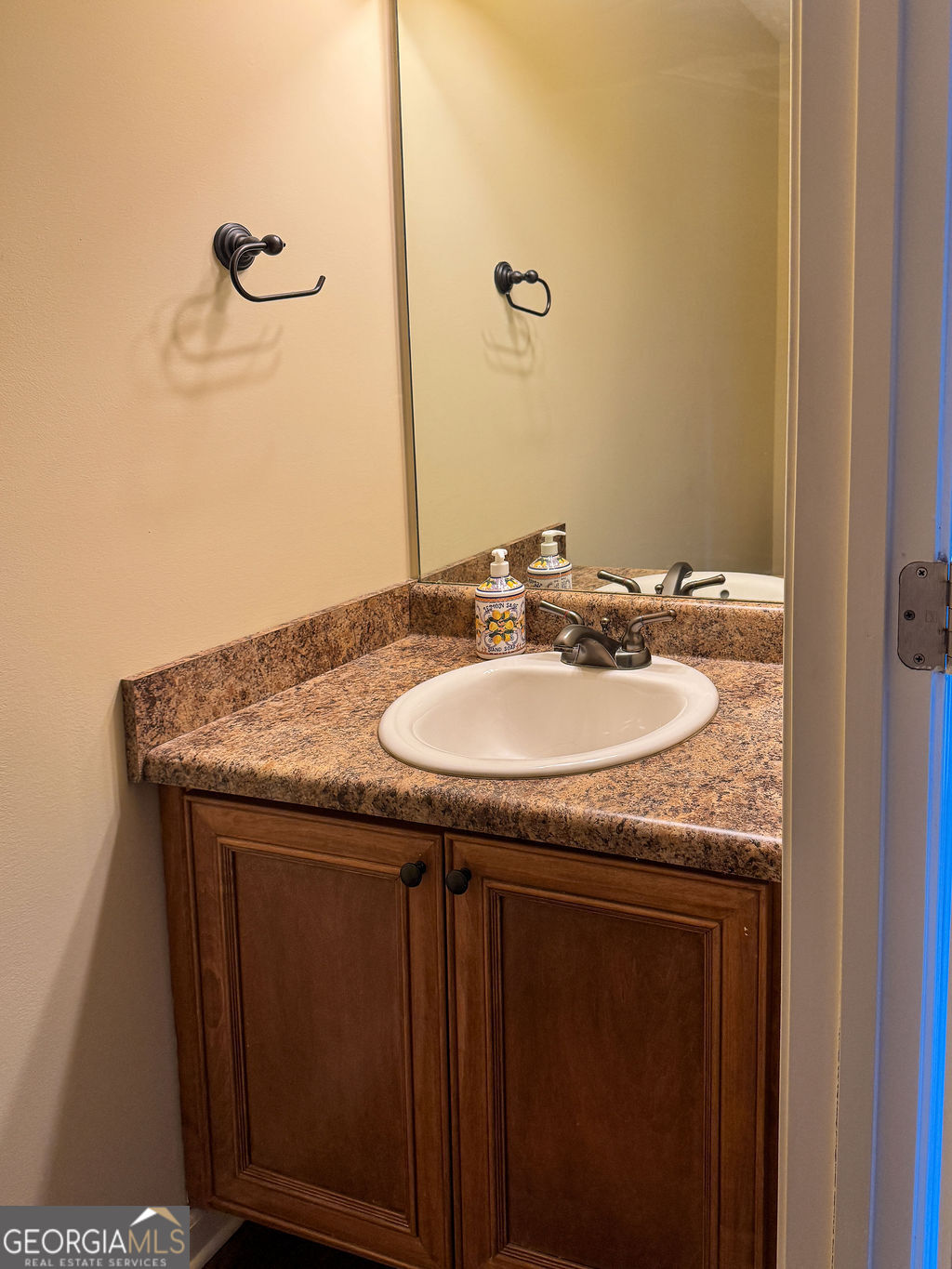 170 Fire Crk Trail Senoia, GA 30276 - Photo 8 of 62 a sink sitting next to a bathroom