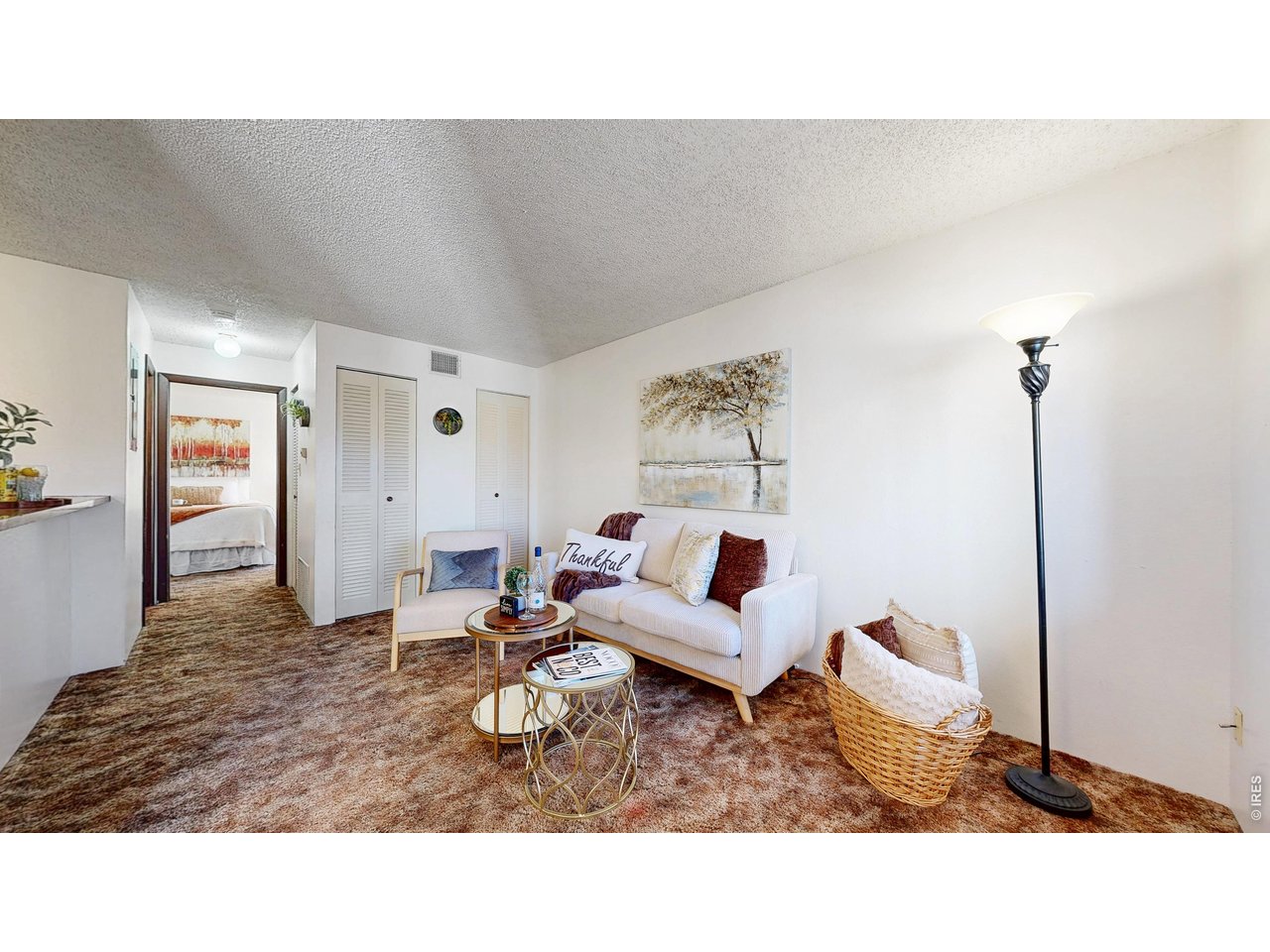 1705 Heatheridge Road, Unit G302 Fort Collins, CO 80526 - Photo 3 of 31 a living room with furniture and wooden floor