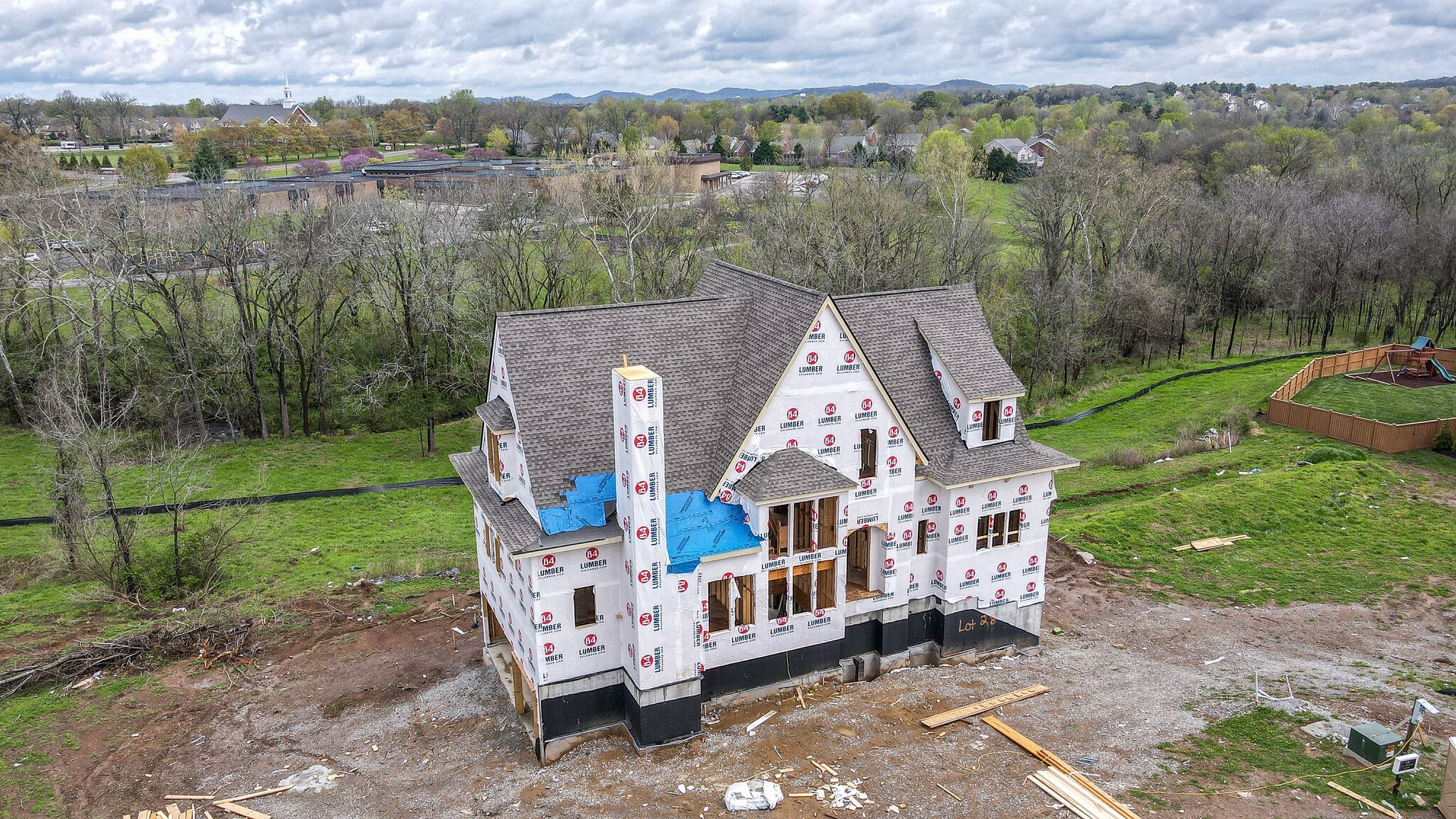 3031 Natures Landing Drive Franklin, TN 37064 - Photo 34 of 45 an aerial view of a house with a yard swimming pool patio and lake view