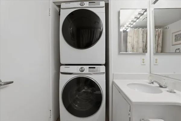a utility room with dryer and washer