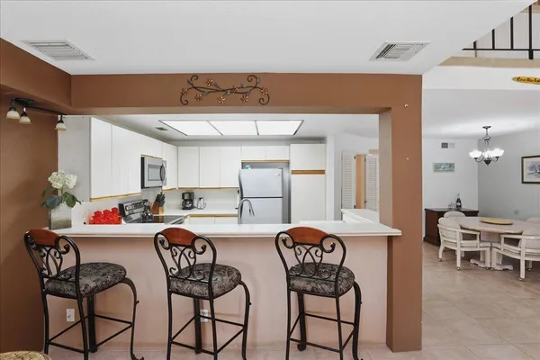 a view of a dining room with furniture