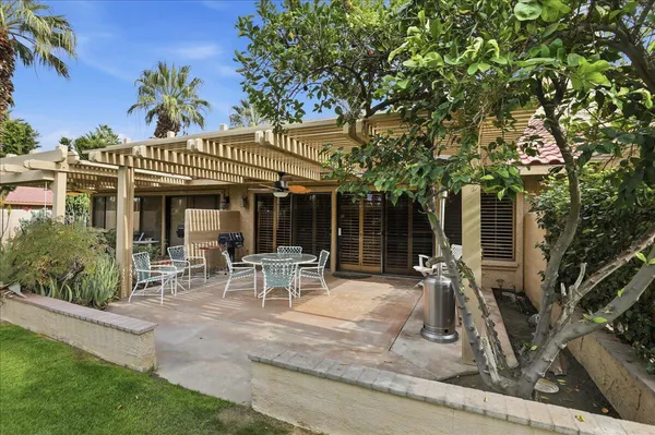 front view of a house with a patio