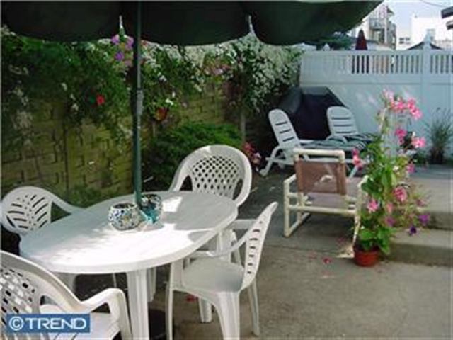 2 B North Baltimore Avenue Ventnor City, NJ 08406 - Photo 5 of 6 a view of a chairs and table in the patio