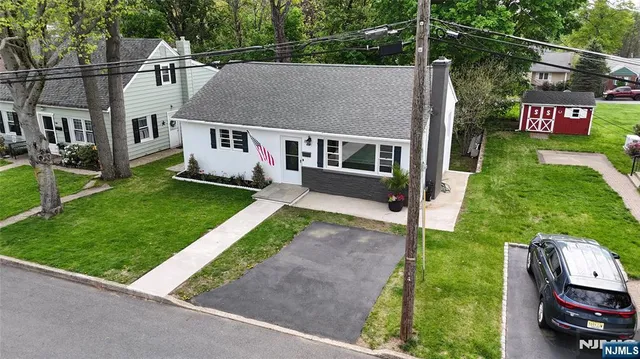 an aerial view of a house having yard
