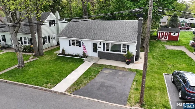 a aerial view of a house with garden