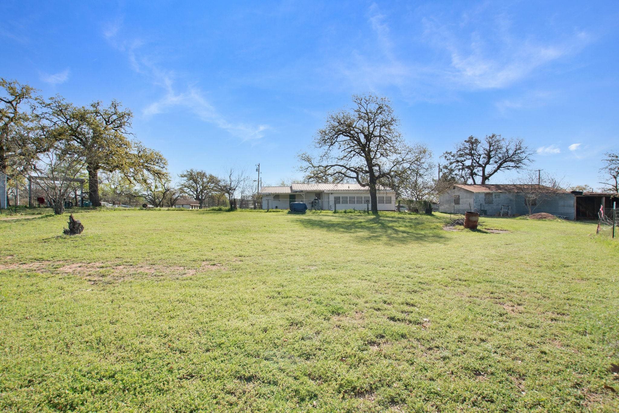 1365 Norma Tow, TX 78672 - Photo 38 of 45 a view of a swimming pool with an outdoor space and seating area