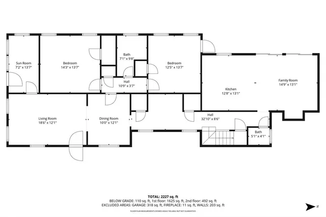 a view of a house with a yard and tree