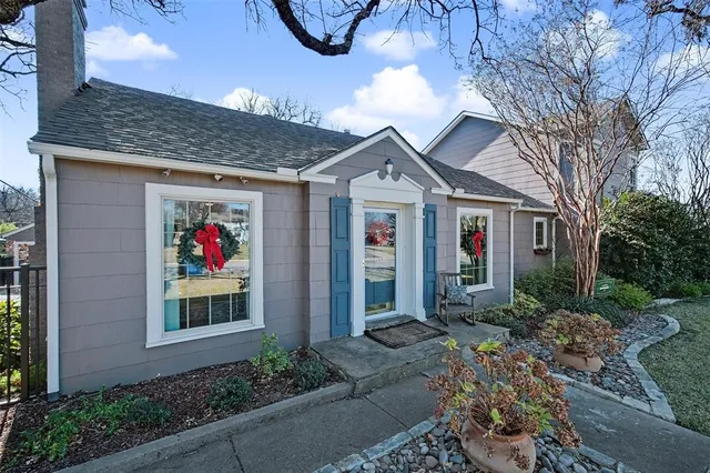 a work room with furniture and windows