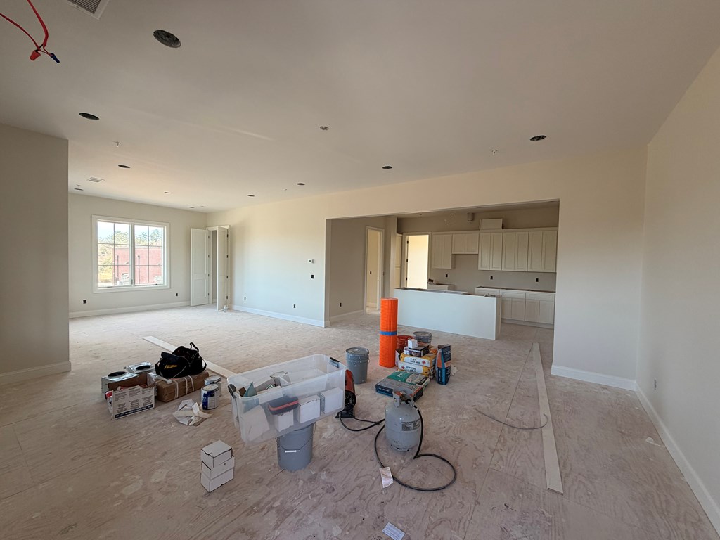 6801 River Road, Unit 407 Columbus, GA 31904 - Photo 3 of 8 a room with furniture a rug and a window