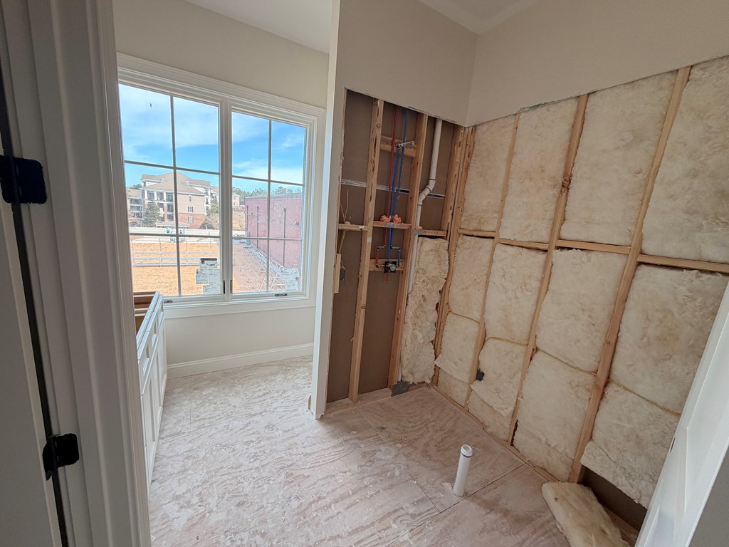 6801 River Road, Unit 407 Columbus, GA 31904 - Photo 5 of 8 a view of an empty room with a window