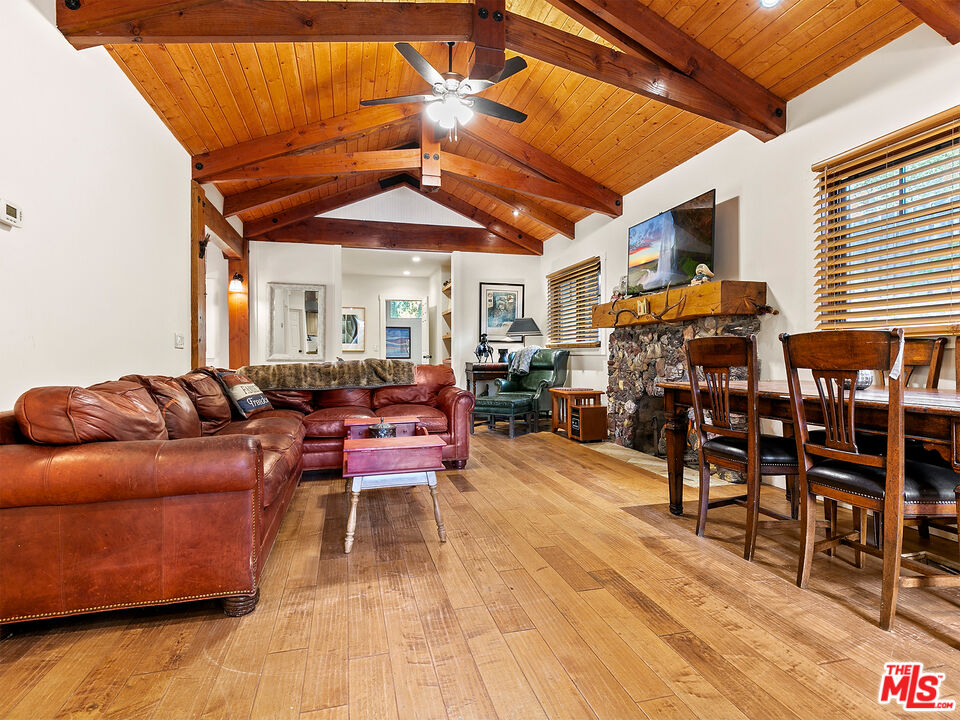 25643 Timpangos Drive Monte Nido, CA 91302 - Photo 12 of 24 a living room with lots of furniture and a large window