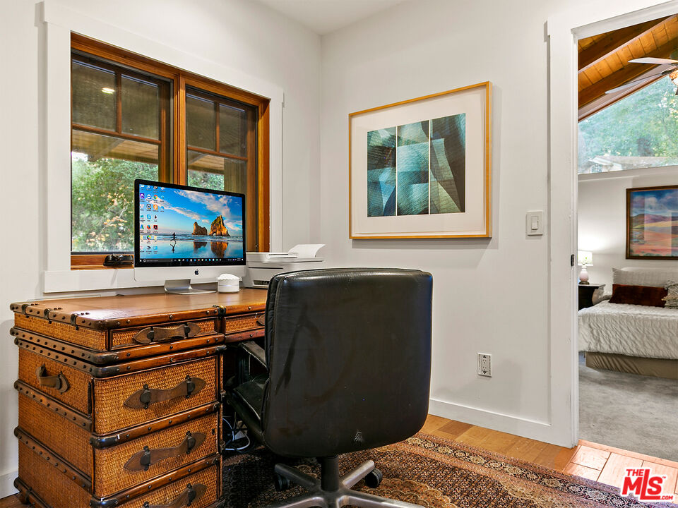 25643 Timpangos Drive Monte Nido, CA 91302 - Photo 22 of 24 a room with furniture and a window
