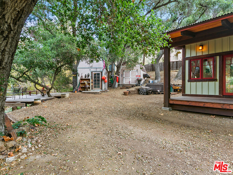 25643 Timpangos Drive Monte Nido, CA 91302 - Photo 4 of 24 a view of a car park in front of a building