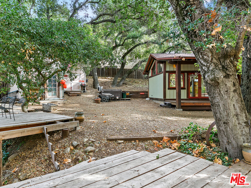 25643 Timpangos Drive Monte Nido, CA 91302 - Photo 5 of 24 a house with trees in the background