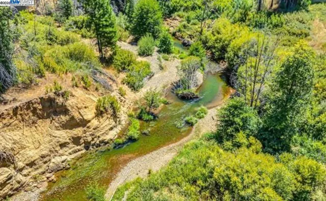 a view of a town with mountains in the background