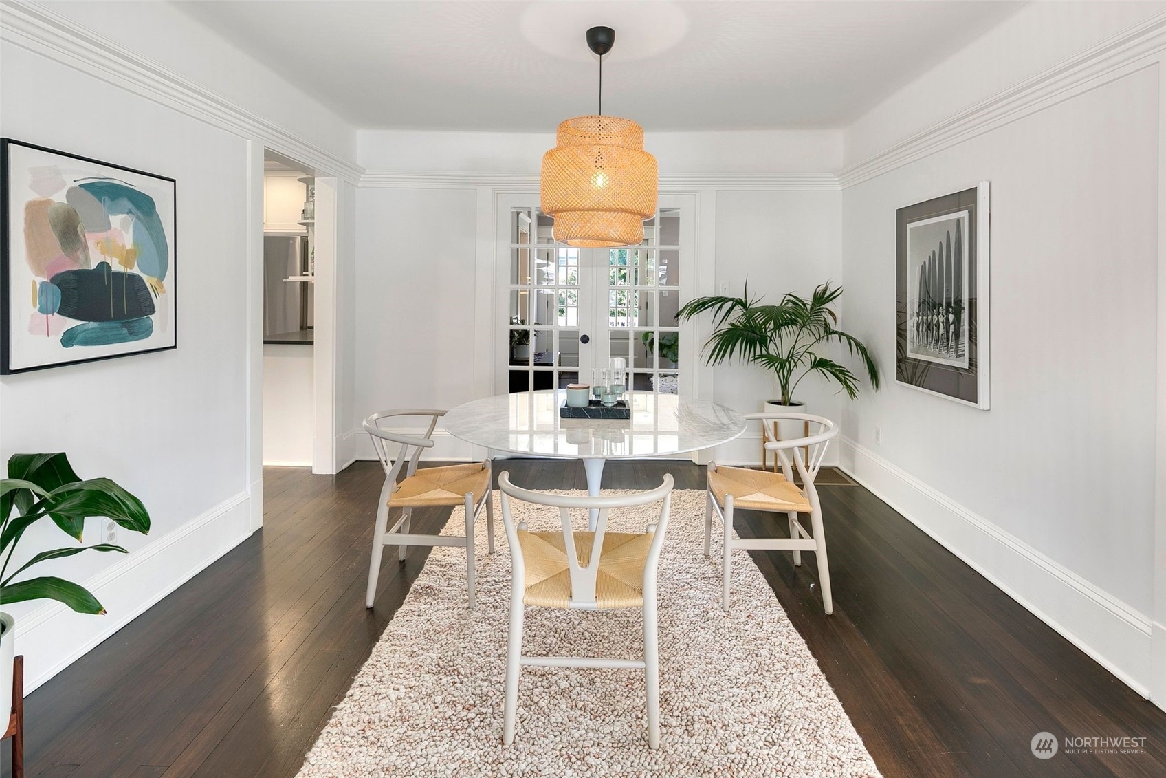 3244 Walnut Avenue Southwest Seattle, WA 98116 - Photo 11 of 40 a view of a dining room with furniture window and wooden floor