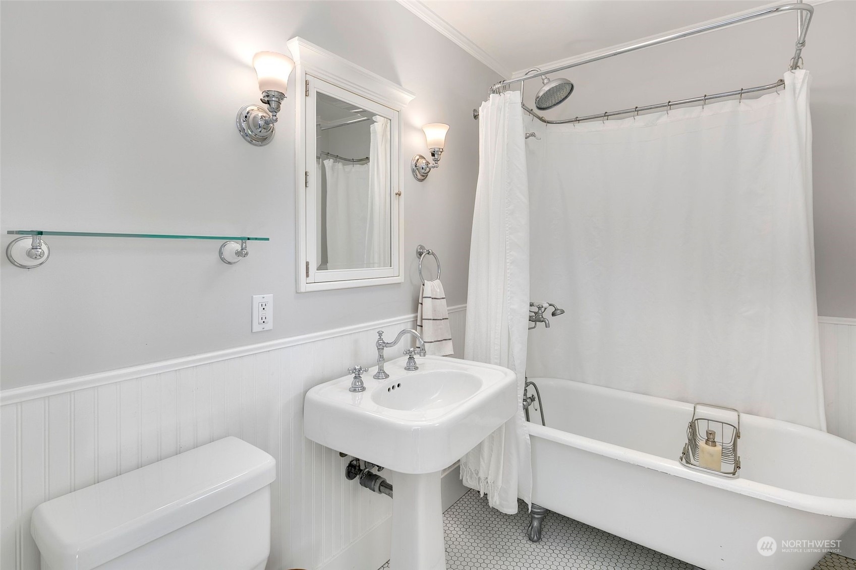 3244 Walnut Avenue Southwest Seattle, WA 98116 - Photo 16 of 40 a bathroom with a sink a toilet and shower