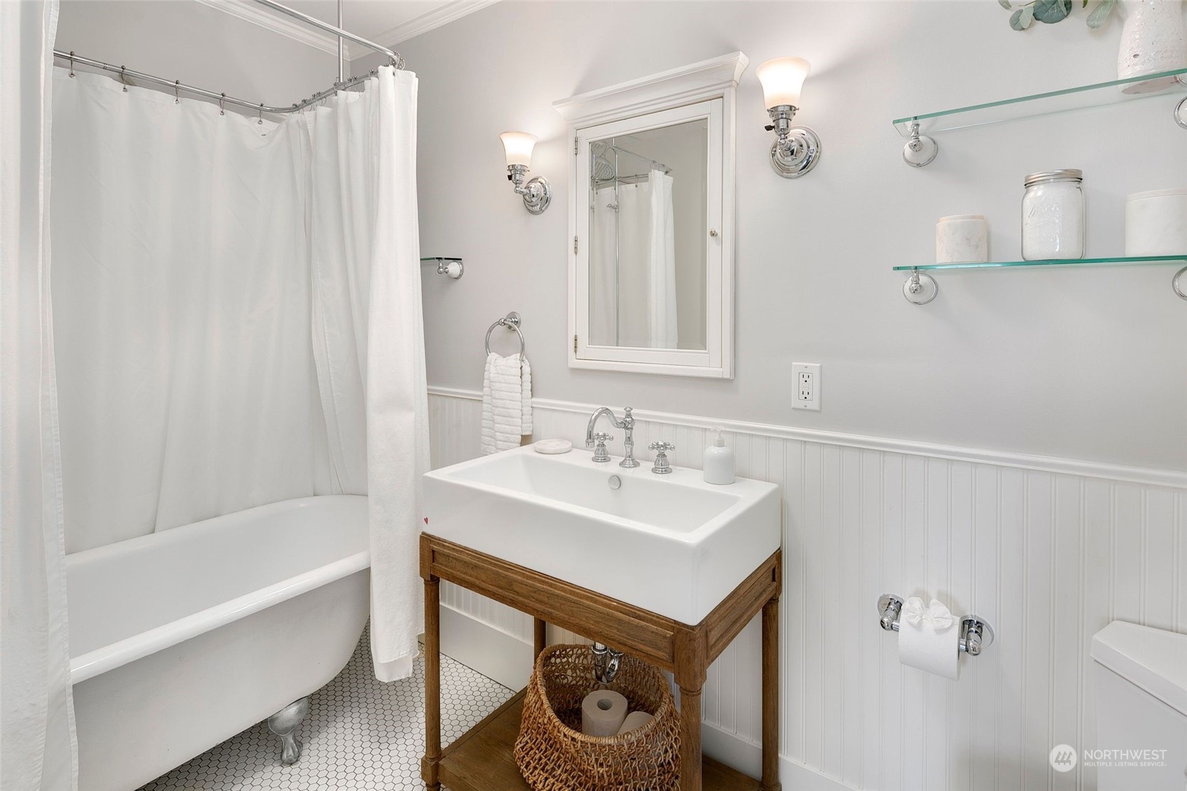 3244 Walnut Avenue Southwest Seattle, WA 98116 - Photo 20 of 40 a bathroom with a sink a toilet and shower