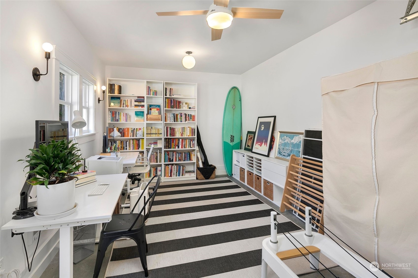 3244 Walnut Avenue Southwest Seattle, WA 98116 - Photo 23 of 40 a view of a livingroom with furniture and staircase