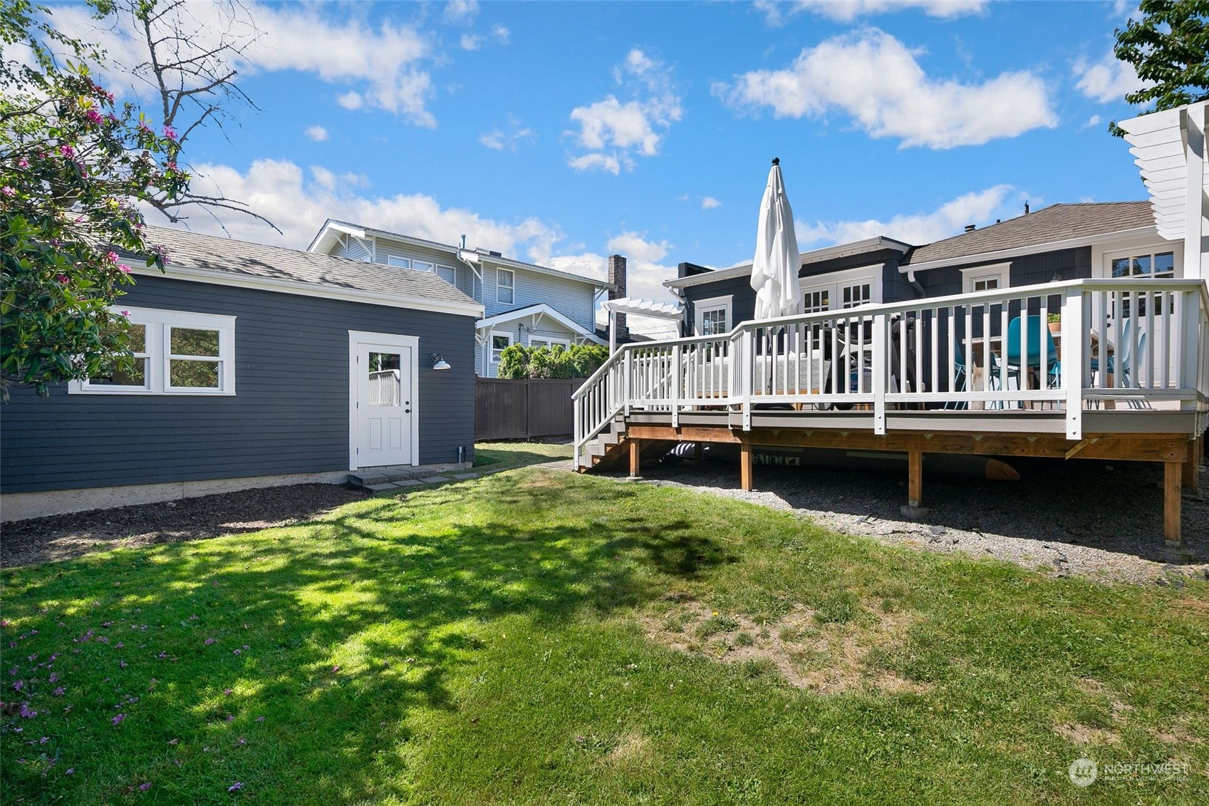 3244 Walnut Avenue Southwest Seattle, WA 98116 - Photo 30 of 40 a view of a house with roof deck