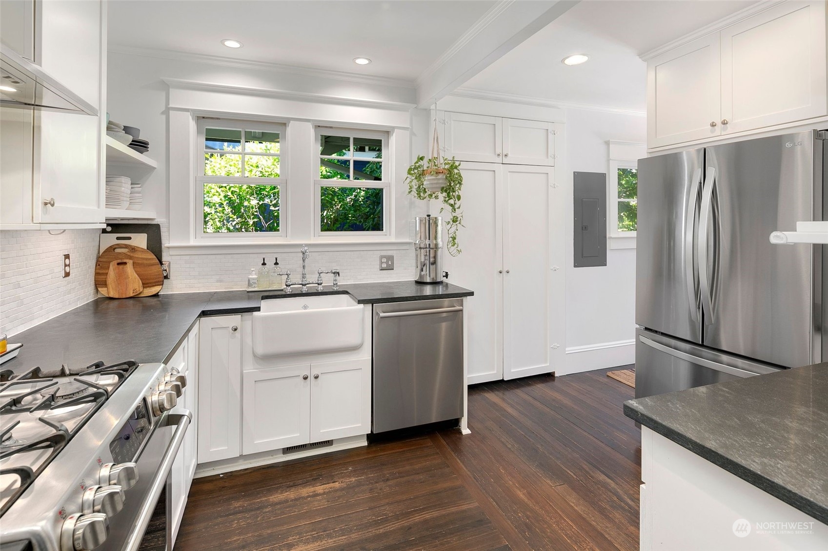 3244 Walnut Avenue Southwest Seattle, WA 98116 - Photo 3 of 40 a kitchen with a refrigerator stove and sink