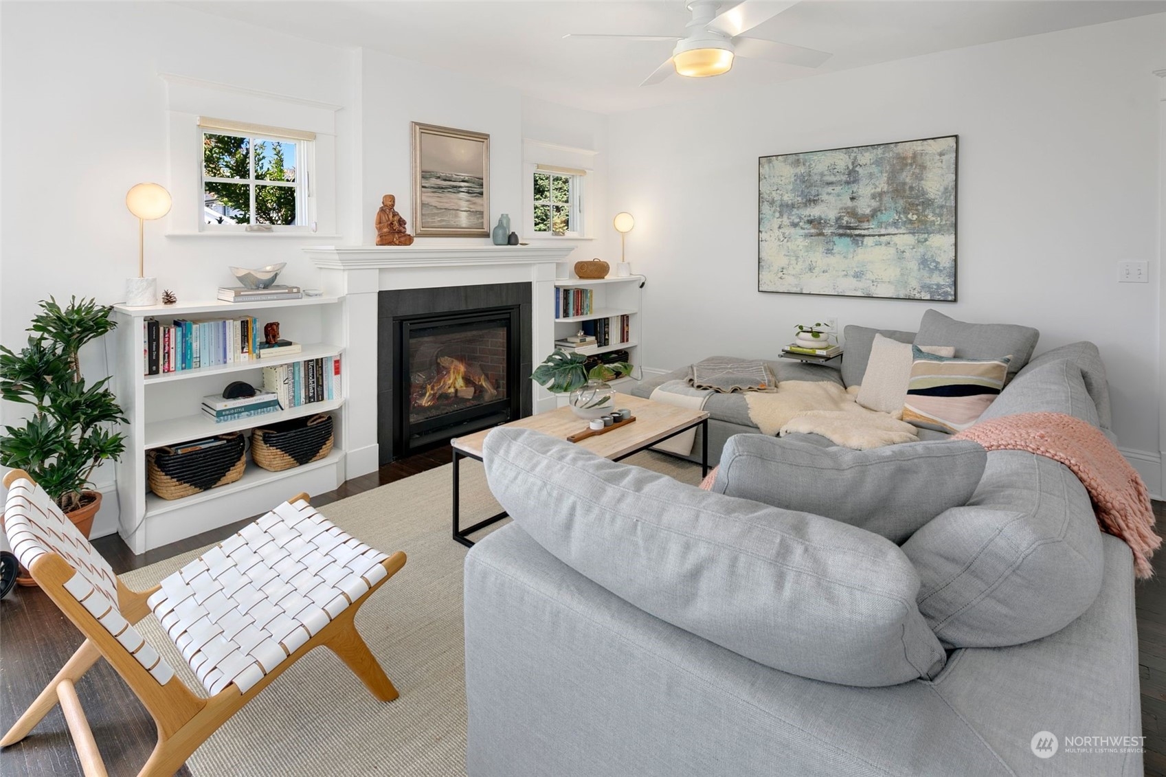 3244 Walnut Avenue Southwest Seattle, WA 98116 - Photo 6 of 40 a living room with furniture and a fireplace