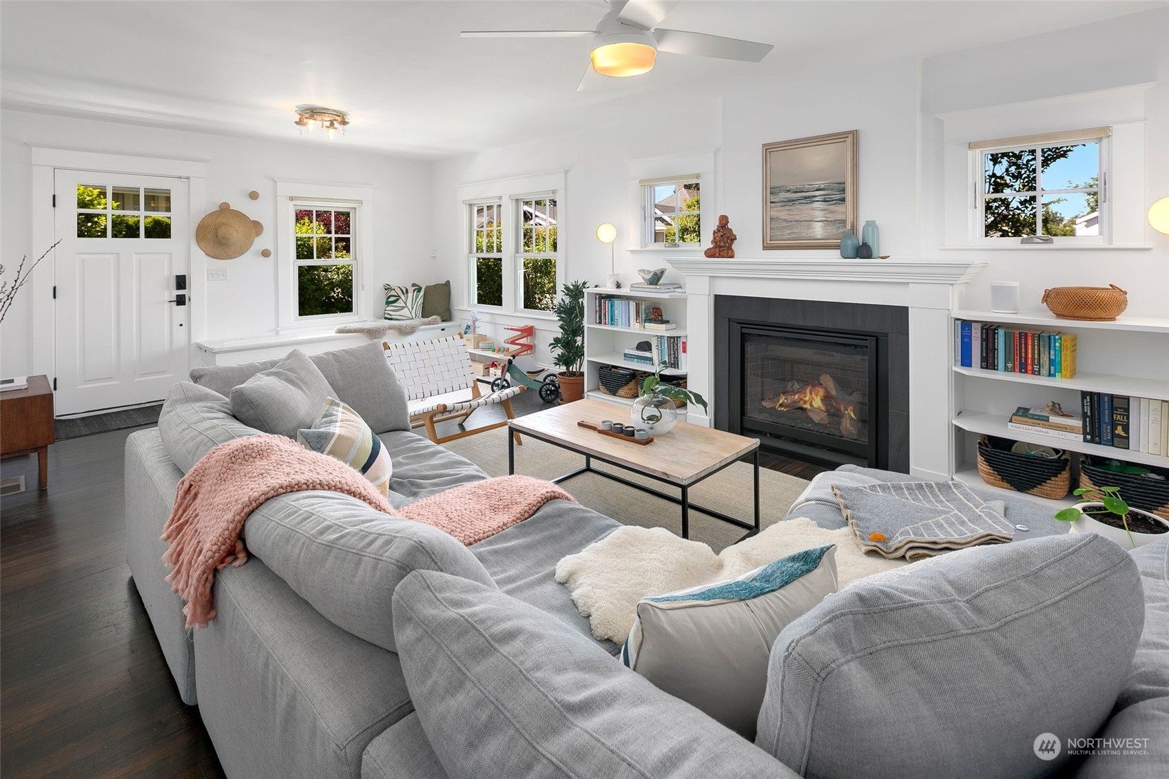 3244 Walnut Avenue Southwest Seattle, WA 98116 - Photo 7 of 40 a living room with furniture and a fireplace