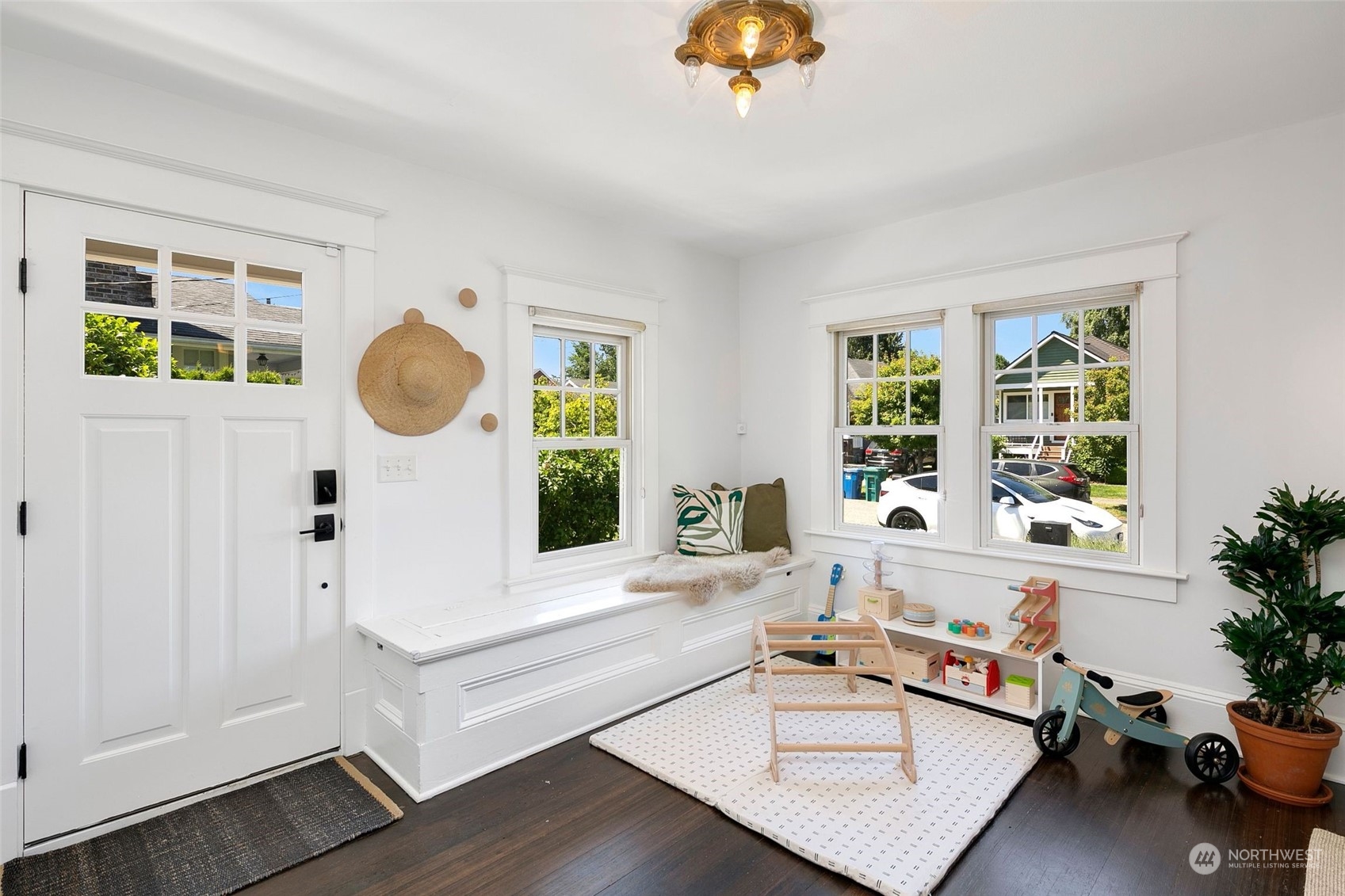 3244 Walnut Avenue Southwest Seattle, WA 98116 - Photo 8 of 40 a living room with furniture and a large window