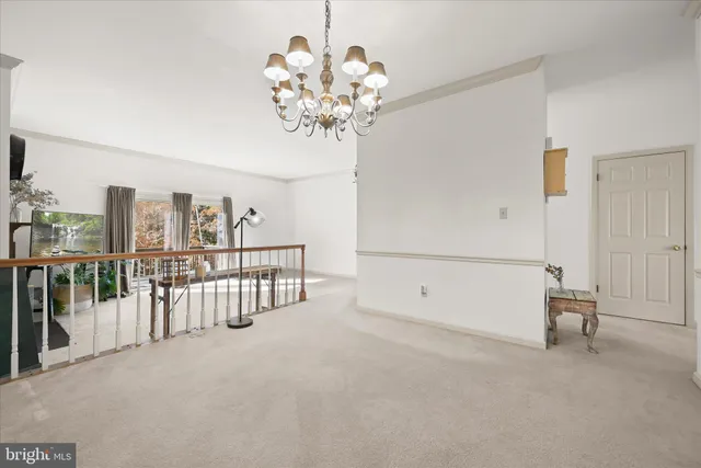 a view of a chandelier in a room