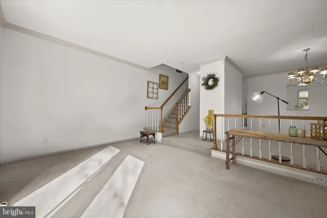 a view of a livingroom with furniture and a fireplace