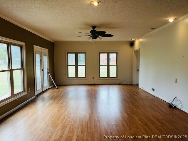 4141 Locks Creek Church Road Fayetteville, NC 28312 - Photo 17 of 23 wooden floor in an empty room with a window