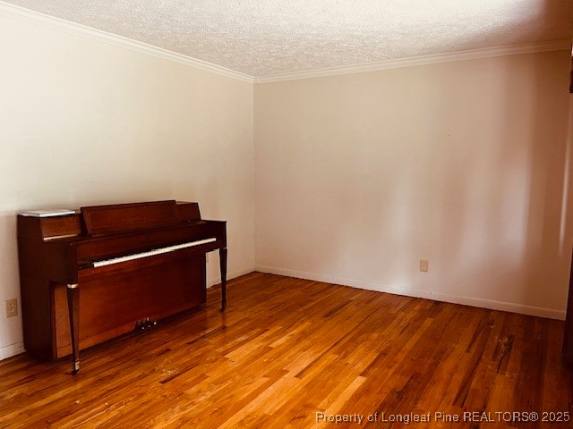 4141 Locks Creek Church Road Fayetteville, NC 28312 - Photo 3 of 23 a room with a bench and wooden floor