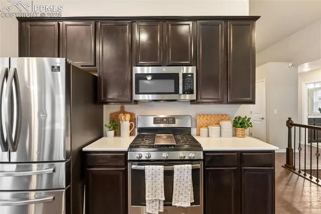 a bedroom with a bed and hallway
