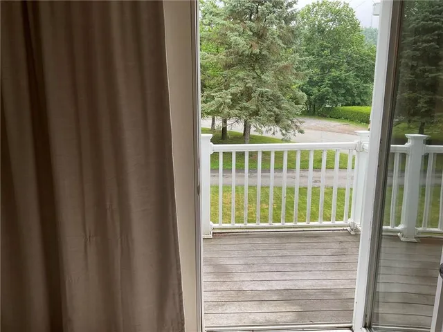 a view of porch with a yard