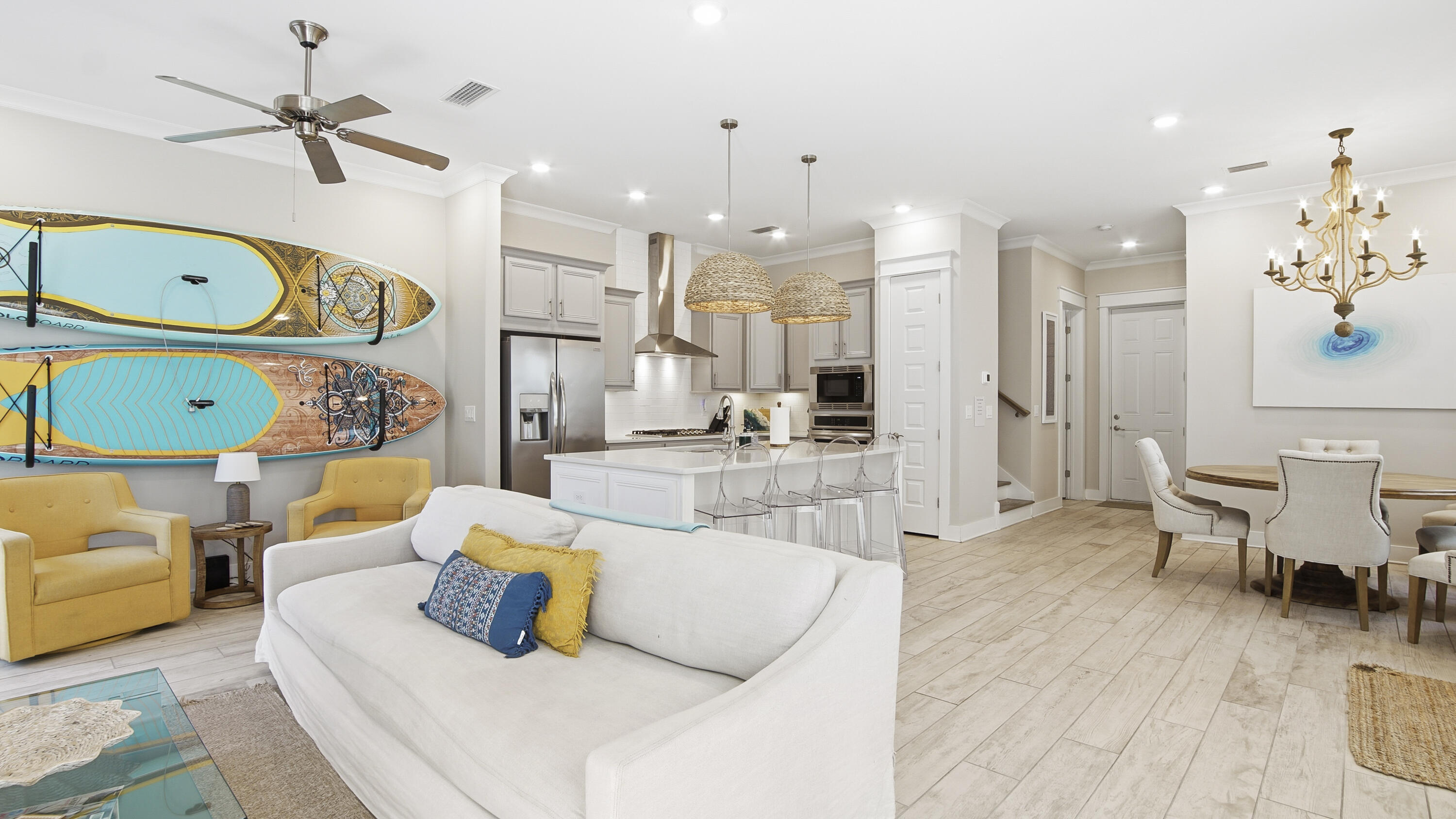 51 Dune Comet Lane, Unit A Inlet Beach, FL 32461 - Photo 12 of 41 a living room with furniture and a chandelier