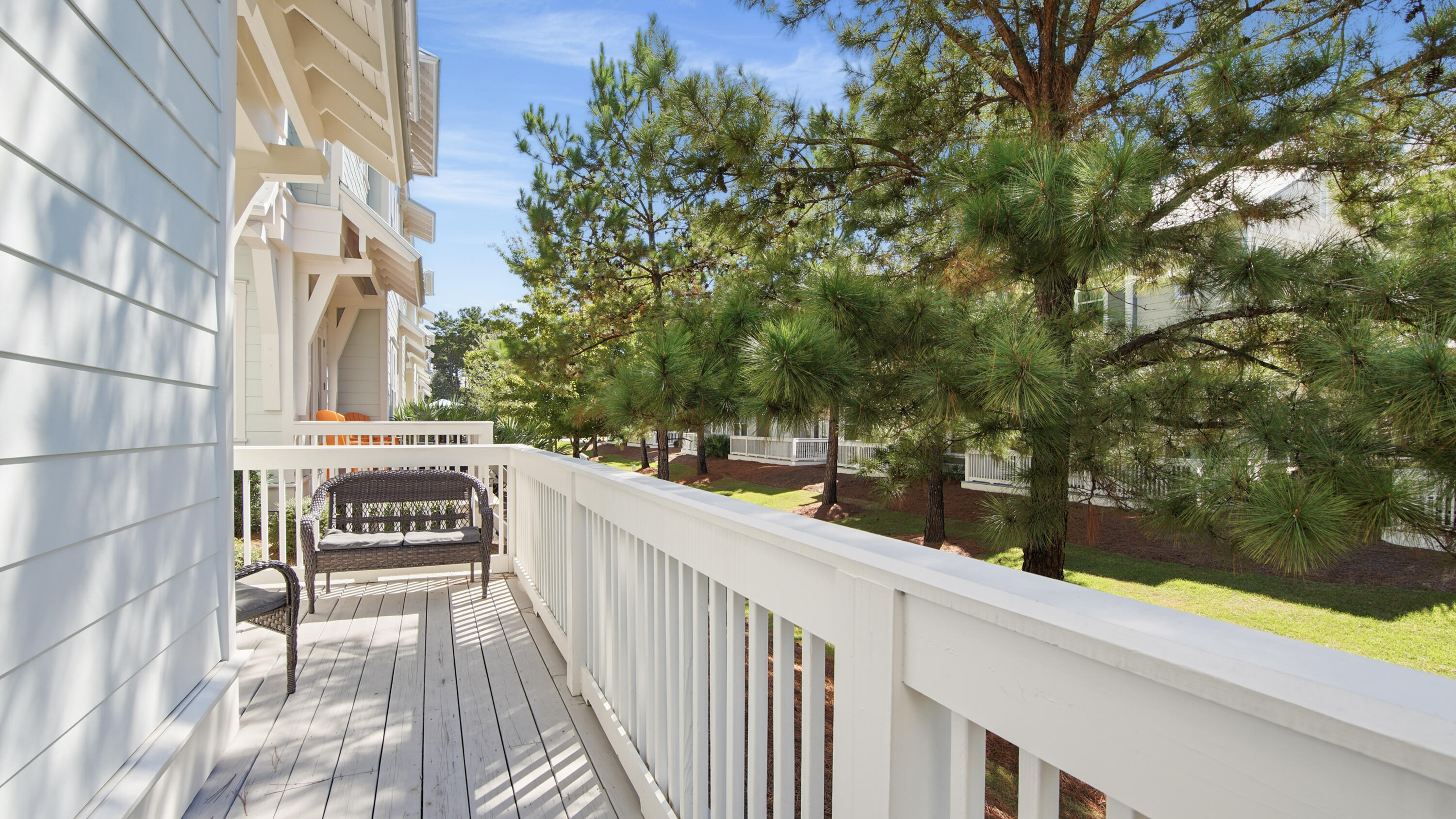 51 Dune Comet Lane, Unit A Inlet Beach, FL 32461 - Photo 15 of 41 a view of a balcony with trees