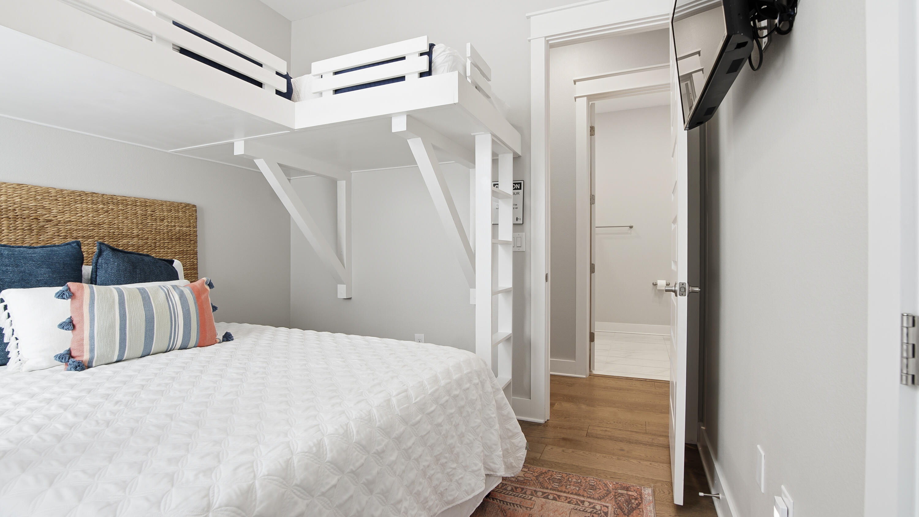 51 Dune Comet Lane, Unit A Inlet Beach, FL 32461 - Photo 22 of 41 a bedroom with a bed and a view of bathroom