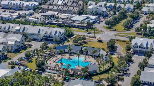 an aerial view of a houses with outdoor space